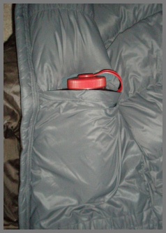 One of the large internal pockets holding water bottle