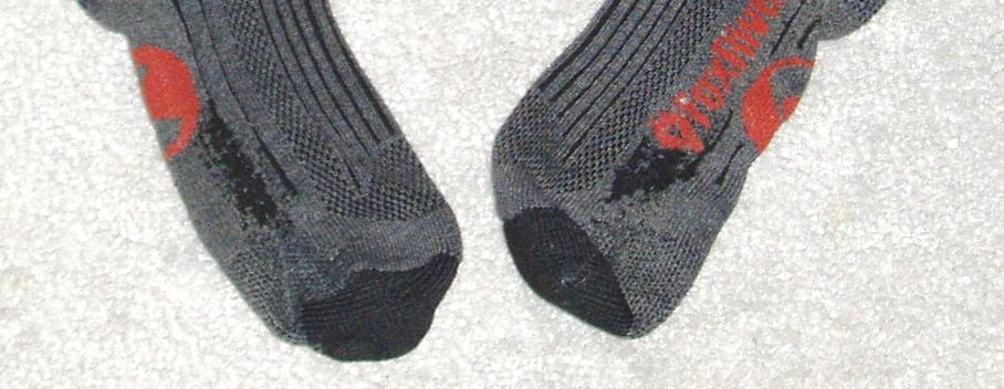 Areas of major wear. There is wear on both sides of the socks.
