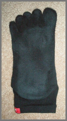 An Injinji sock showing the wear pattern on the sole