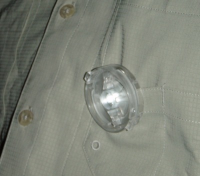 LED light hung from shirt pocket