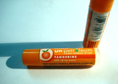 Larger view of Alba lip balm tubes, old and new