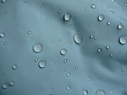 Initial water drops on fabric