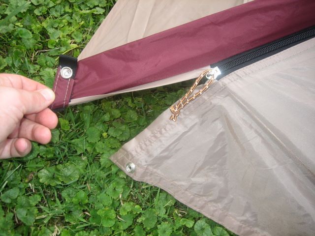 Close-up of the bottom of the fly zipper with snap