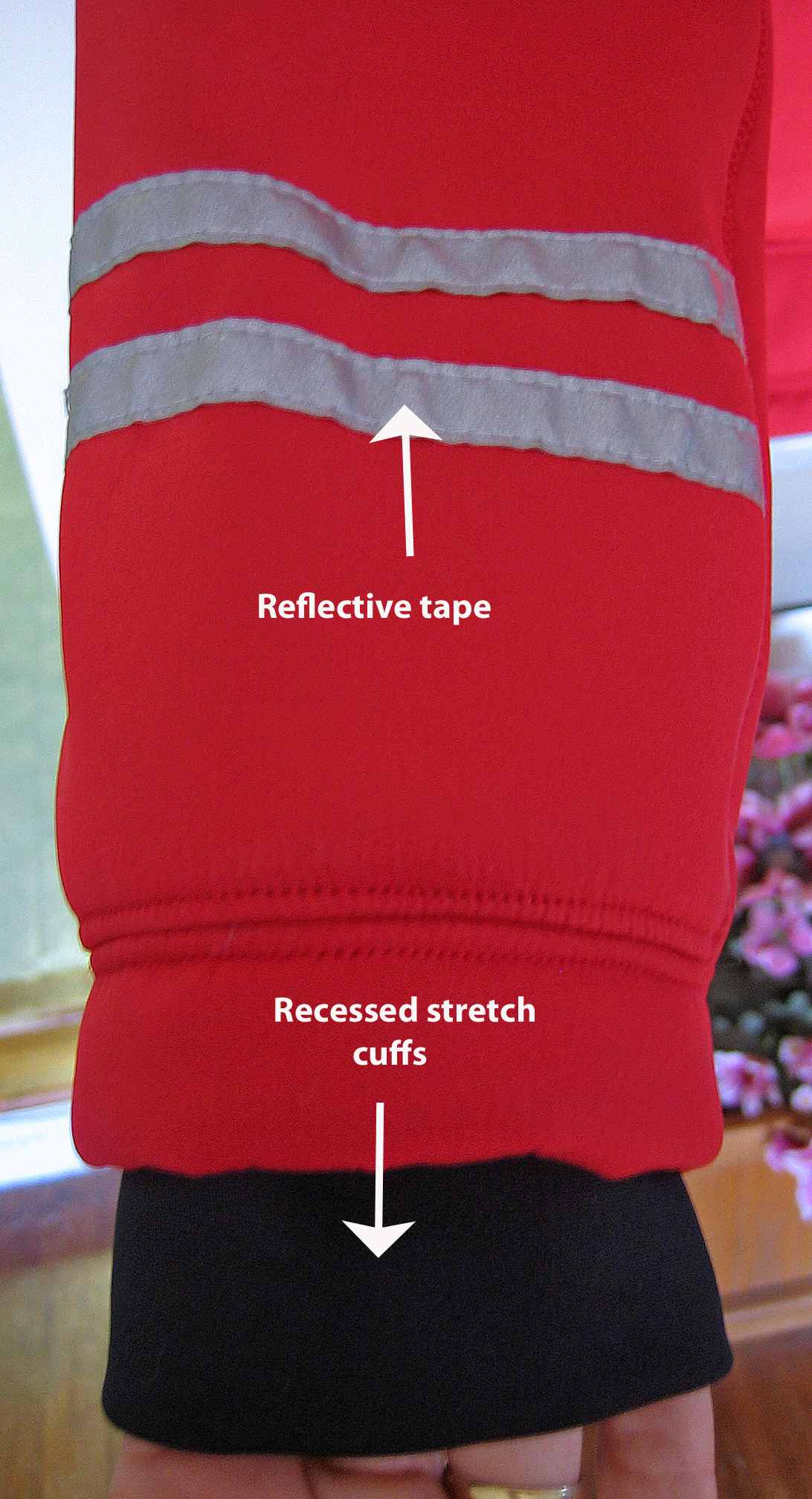 Sleeve with reflective strips and recessed cuffs