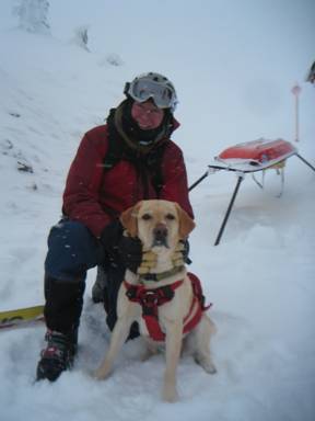 Author in the Exile with Darby the avalanche dog