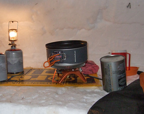 Inside an igloo at 11,500 ft (3505 m) in February, we used the Helios to melt snow for water and prepare meals and beverages for two.