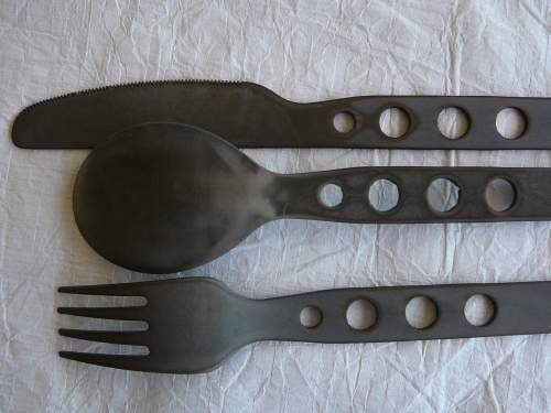 reverse of tarnished cutlery