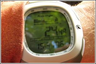 Altimeter mode showing elevation profile and current time.