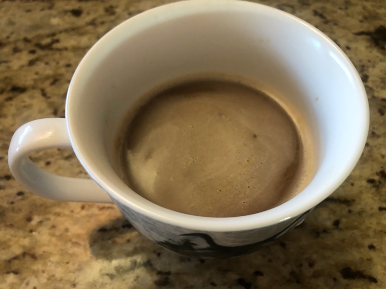 A cup of coffee

Description automatically generated with medium confidence