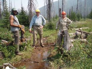 Montana trail crew in the mud. Author in center