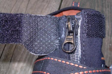 Hook and loop at zipper top