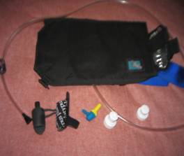 Top, shower attachment, holster Bottom L to R: neoprene bite valve cover, bite valve cover, on-off valve, nipple top, closure top