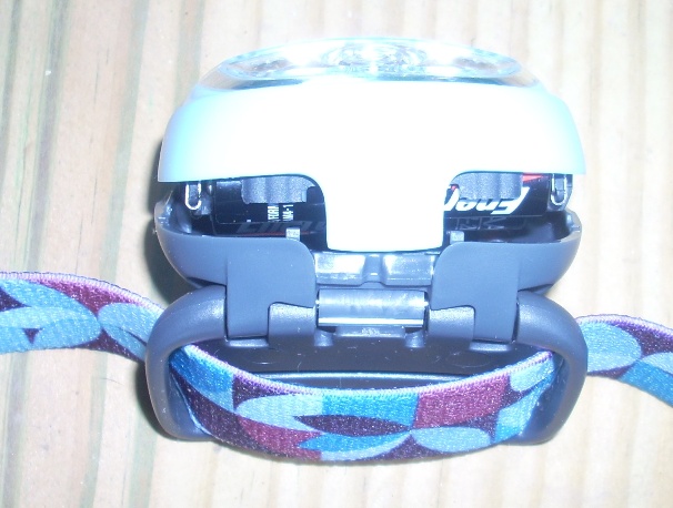 Opening tab, strap attachment