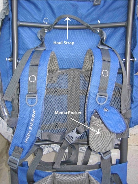 Haul strap, media pocket, shoulder straps, mesh back ring and pin system visible