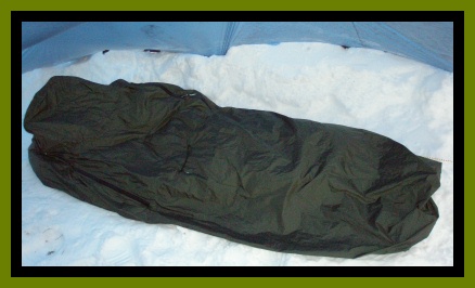 Bivy in open-sided shelter