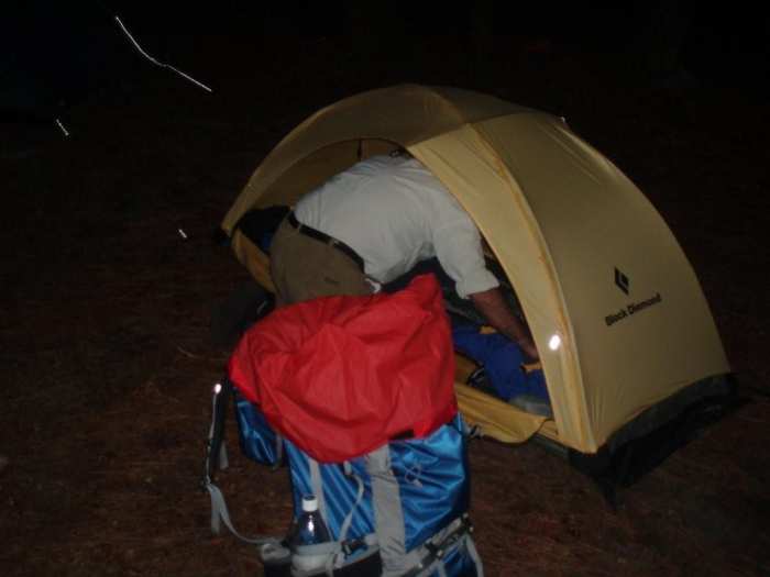 setting up tent in the dark