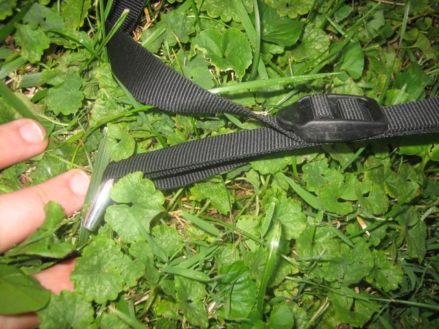 Close-up of the stake strap for the fly that creates the vestibule and the strap's adjustable slide