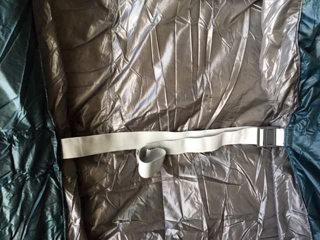 Strap to secure sleeping pad