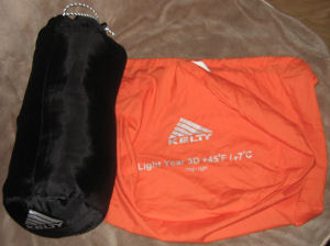 The Sleeping Bag stuffed in stuff sack with the storage bag