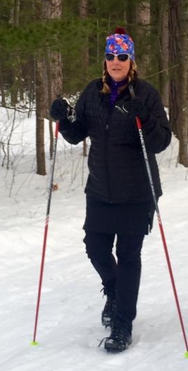 Tester walking on late season ski trails
