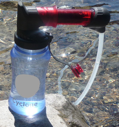 Pump attached to quick connect bottle adapter